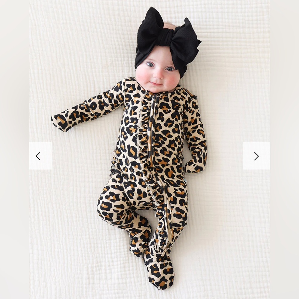 Posh peanut leopard onesie, double zipper, hand covers, ruffle butt.